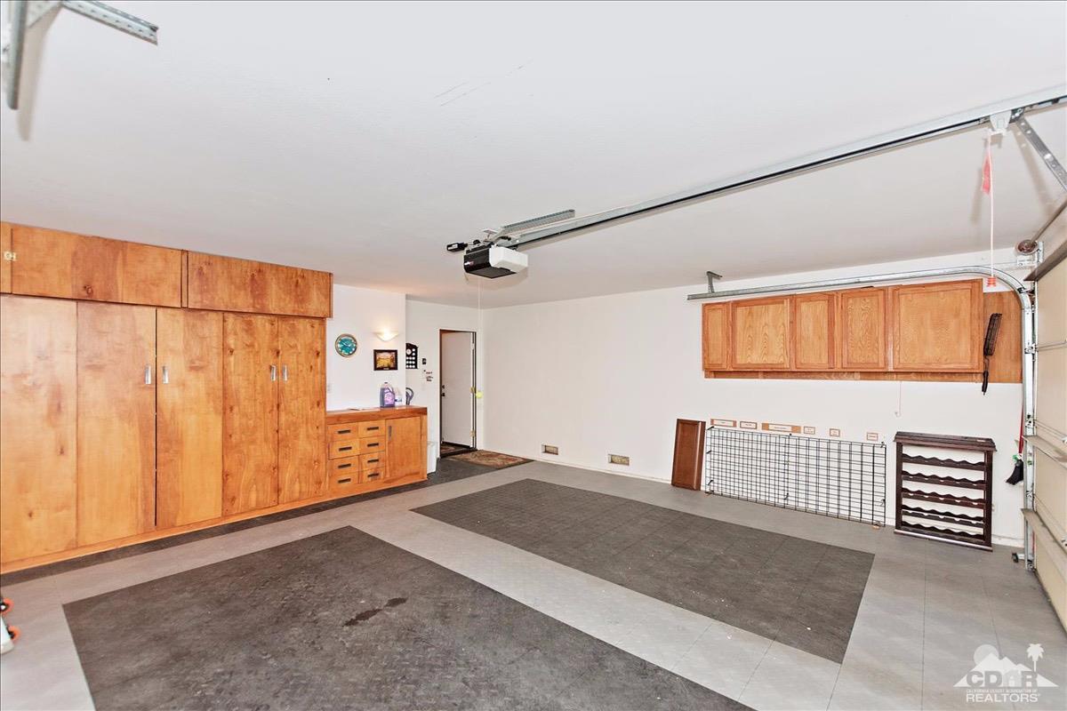 48010 Vía Vallarta La Quinta, CA 92253 - Photo 23 of 37 a view of livingroom with hardwood