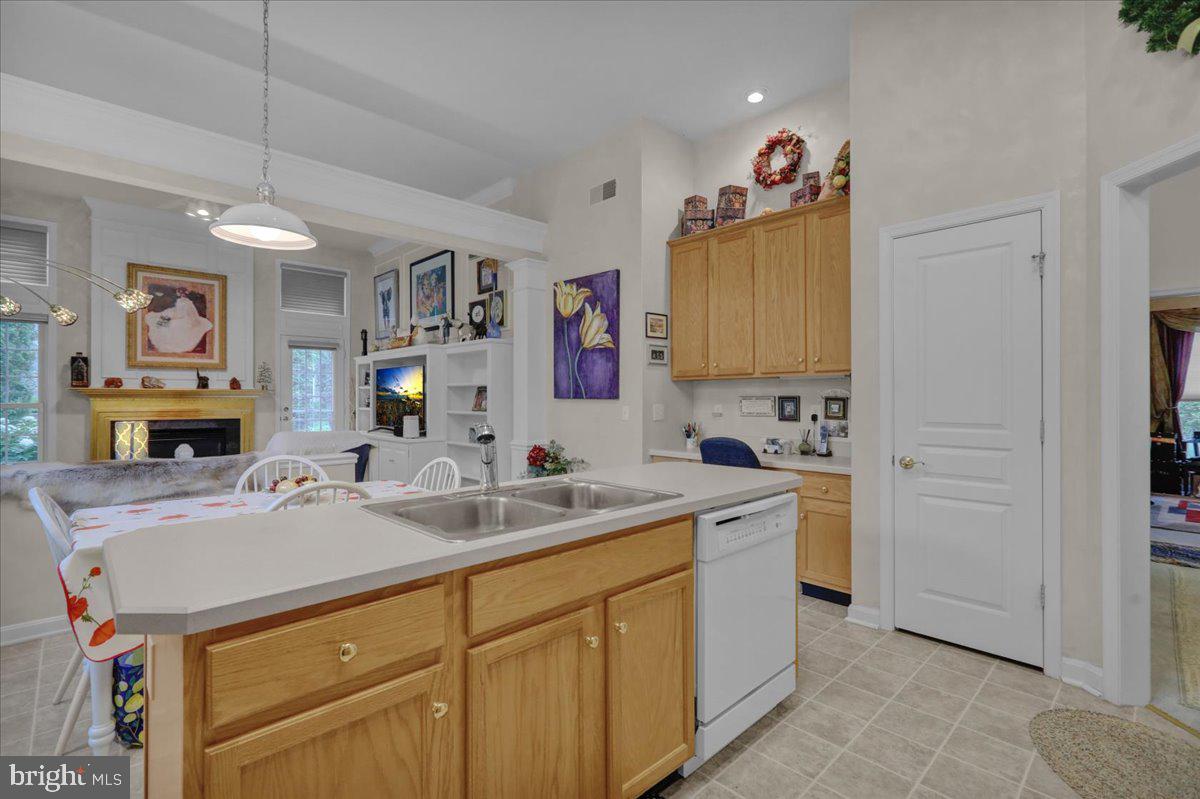 213 Aster Circle Kennett Square, PA 19348 - Photo 16 of 39 a kitchen with a sink cabinets and window