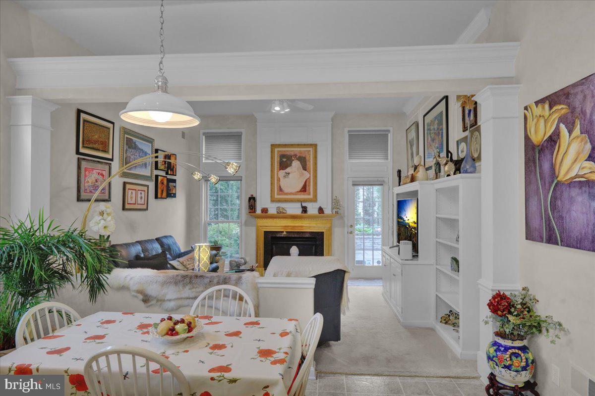 213 Aster Circle Kennett Square, PA 19348 - Photo 17 of 39 a bedroom with a bed and a fireplace