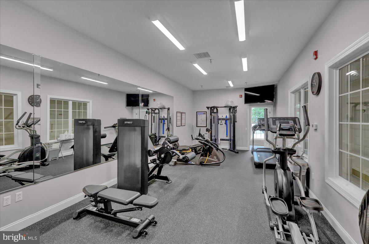 213 Aster Circle Kennett Square, PA 19348 - Photo 37 of 39 a view of a room with gym equipment