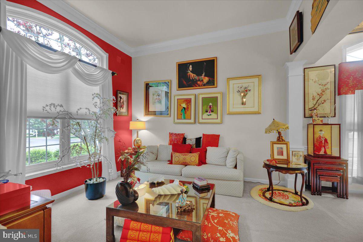 213 Aster Circle Kennett Square, PA 19348 - Photo 9 of 39 a living room with furniture and a window