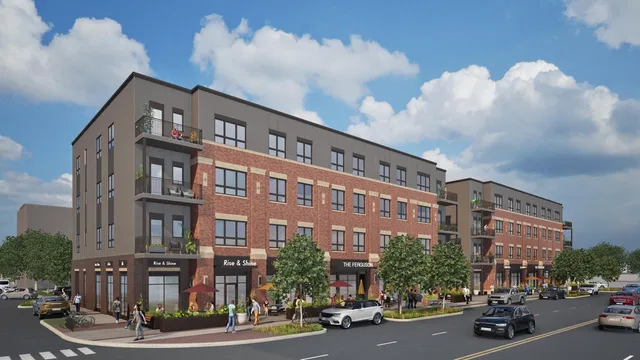 a city street lined with buildings and cars