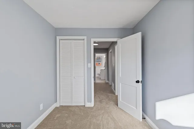 an empty room with closet