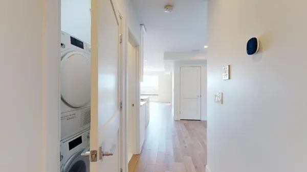a bathroom with a tub and a window