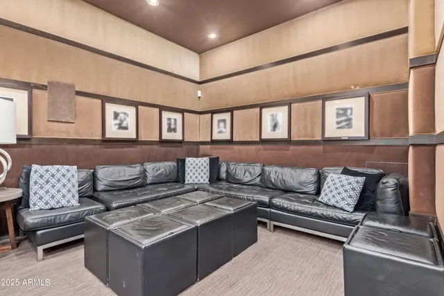 a living room with furniture and a night stand