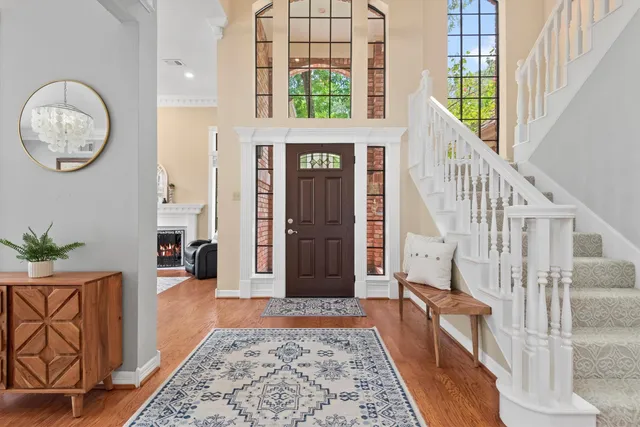 a view of an entryway with a rug