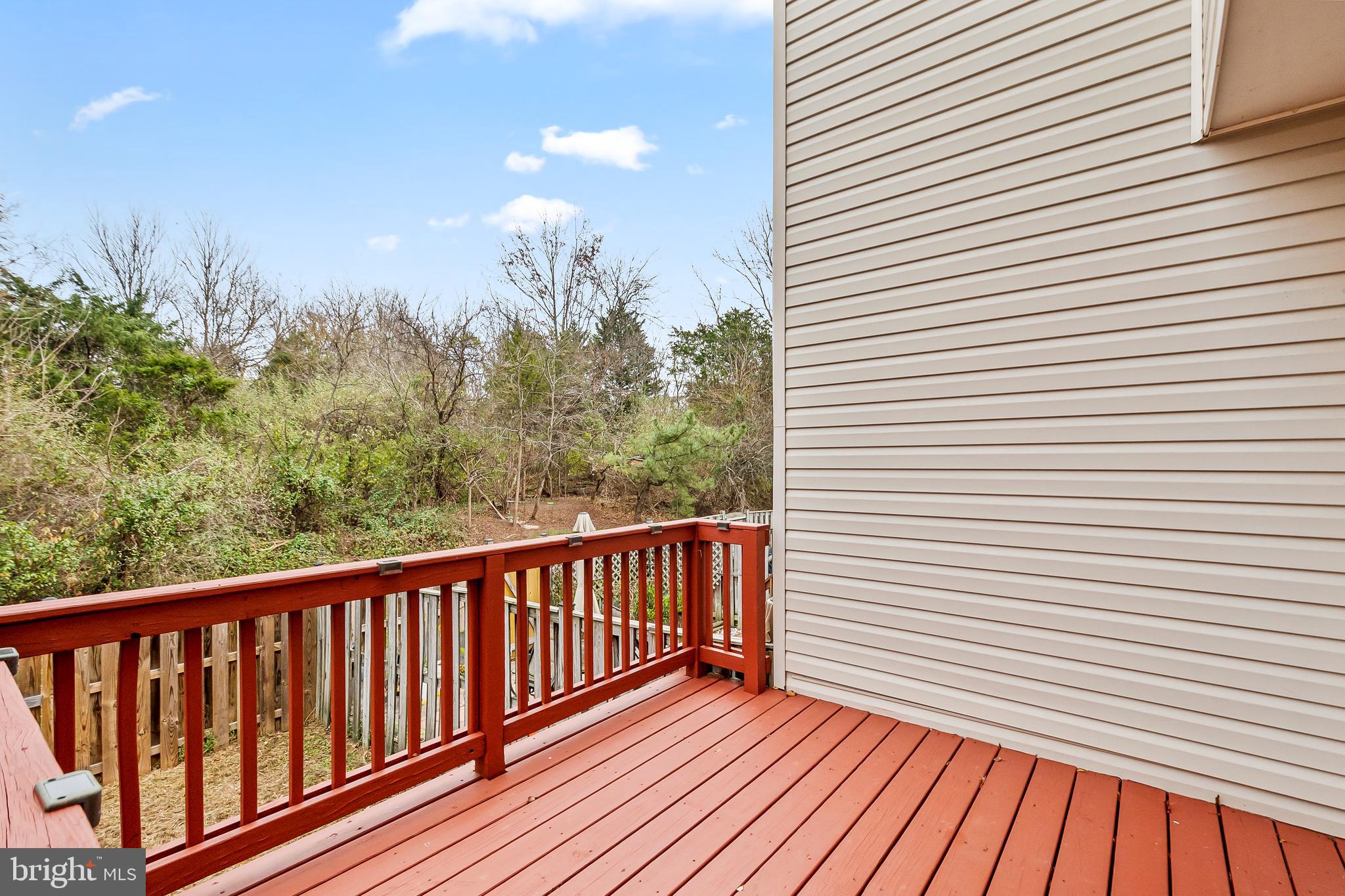 10305 Butternut Circle Manassas, VA 20110 - Photo 13 of 29 a view of a balcony with wooden floor
