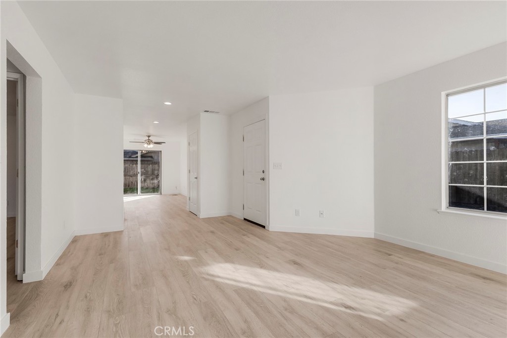 4 Cloud Court Chico, CA 95928 - Photo 12 of 46 wooden floor in an empty room with a window