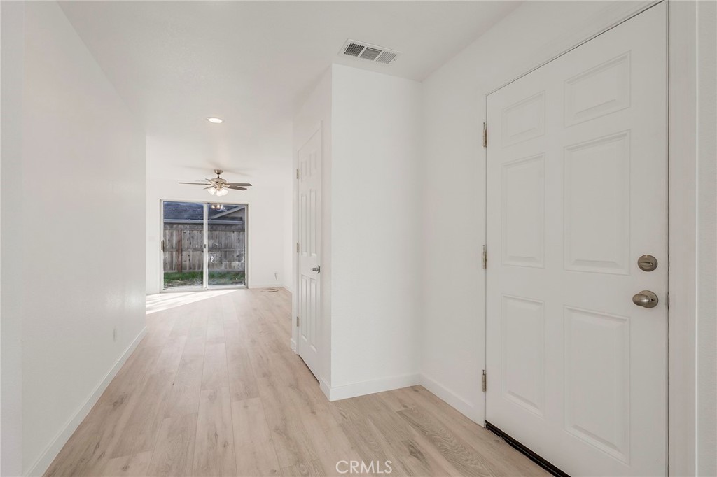 4 Cloud Court Chico, CA 95928 - Photo 14 of 46 a view of a room with wooden floor closet and windows