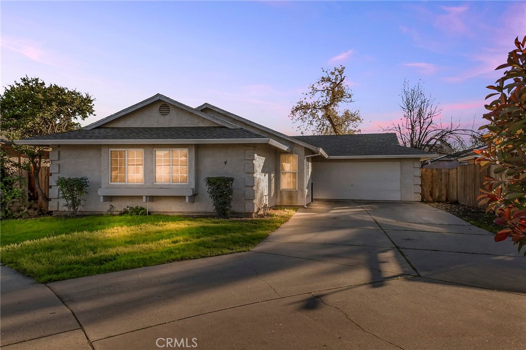 4 Cloud Court Chico, CA 95928 - Photo 2 of 46 a front view of a house with a yard