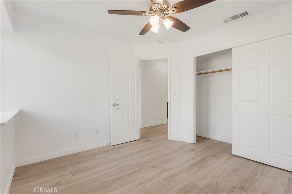 4 Cloud Court Chico, CA 95928 - Photo 27 of 46 a view of an empty room with wooden floor