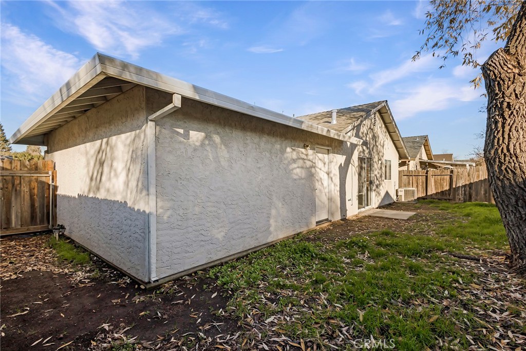 4 Cloud Court Chico, CA 95928 - Photo 30 of 46 a backyard of a house with lots of green space