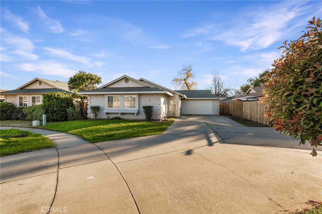 4 Cloud Court Chico, CA 95928 - Photo 3 of 46 front view of a house next to a yard