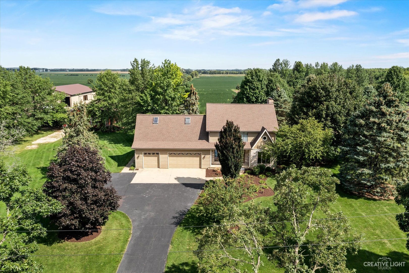41-w492 Rohrsen Road Hampshire, IL 60140 - Photo 3 of 39 an aerial view of a house with yard and outdoor seating