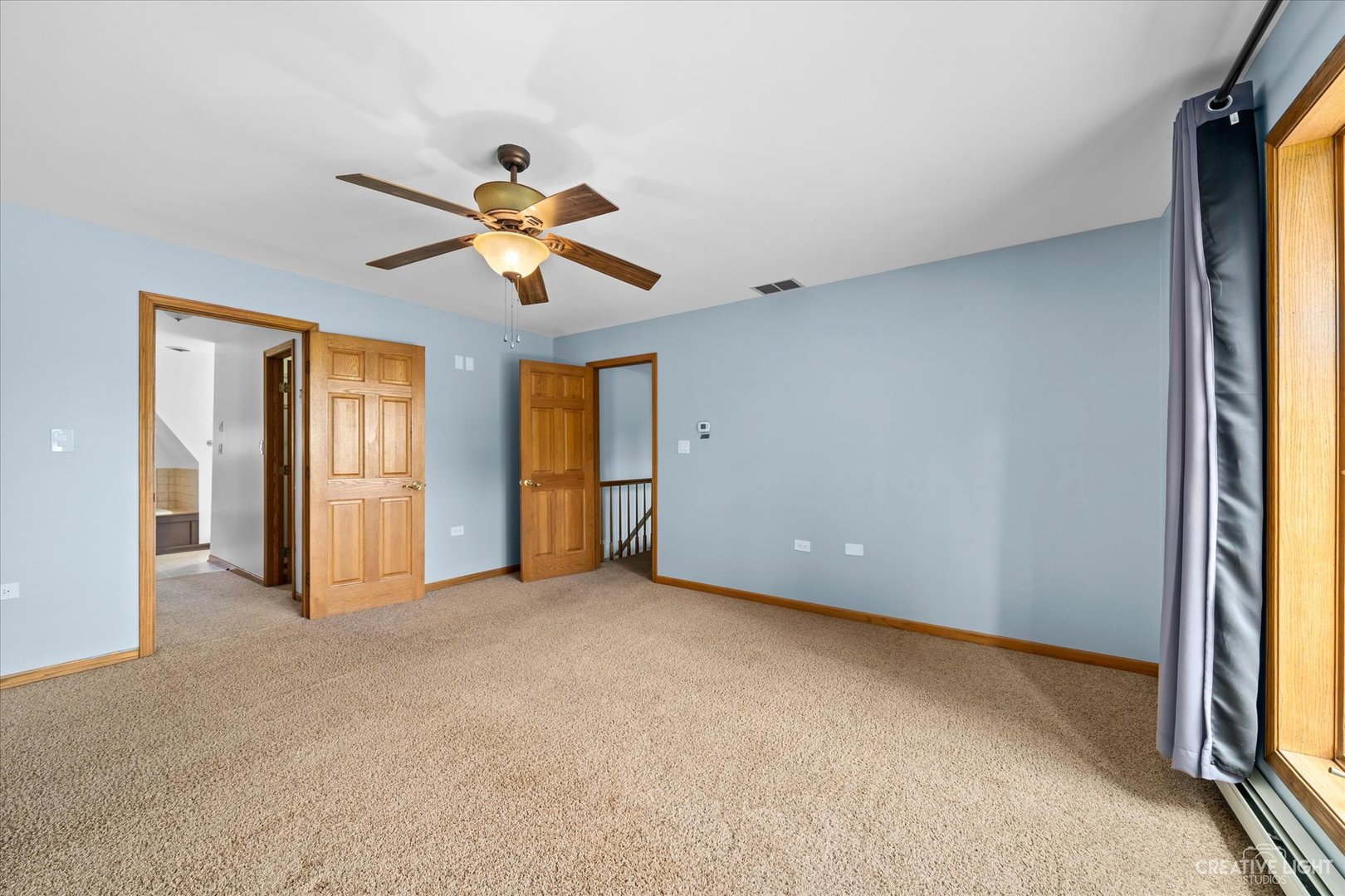 41-w492 Rohrsen Road Hampshire, IL 60140 - Photo 22 of 39 a view of n empty room with window and ceiling fan