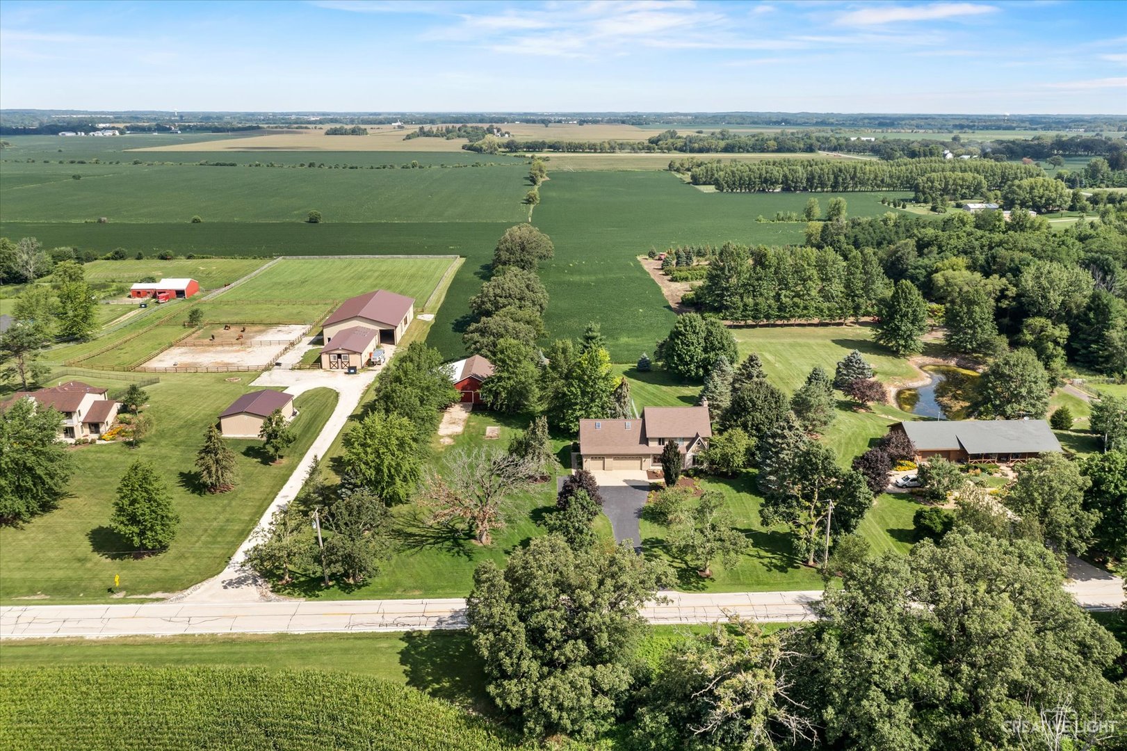 41-w492 Rohrsen Road Hampshire, IL 60140 - Photo 4 of 39 an aerial view of a houses with outdoor space and a lake view