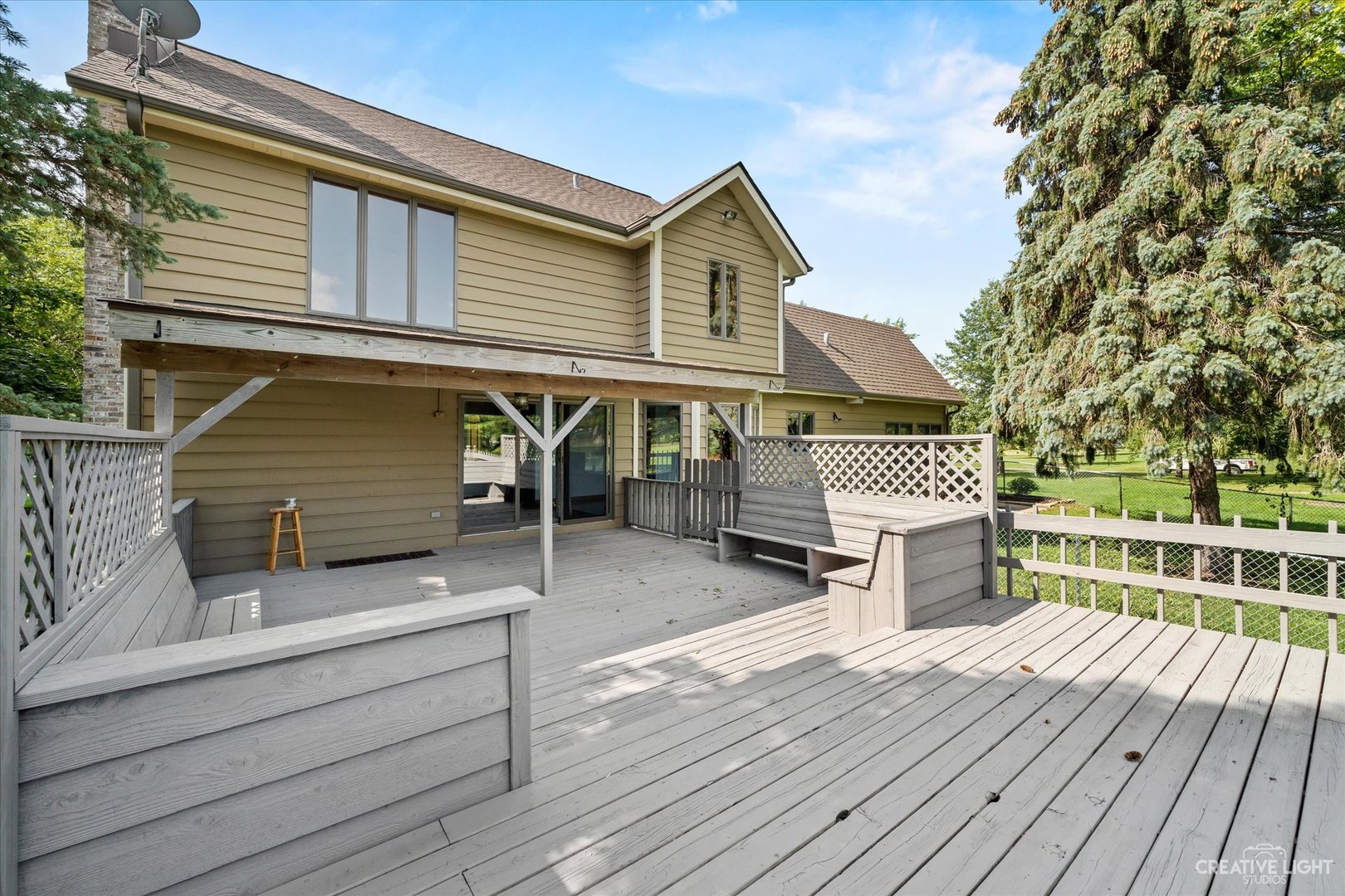41-w492 Rohrsen Road Hampshire, IL 60140 - Photo 35 of 39 a view of house with a deck and furniture