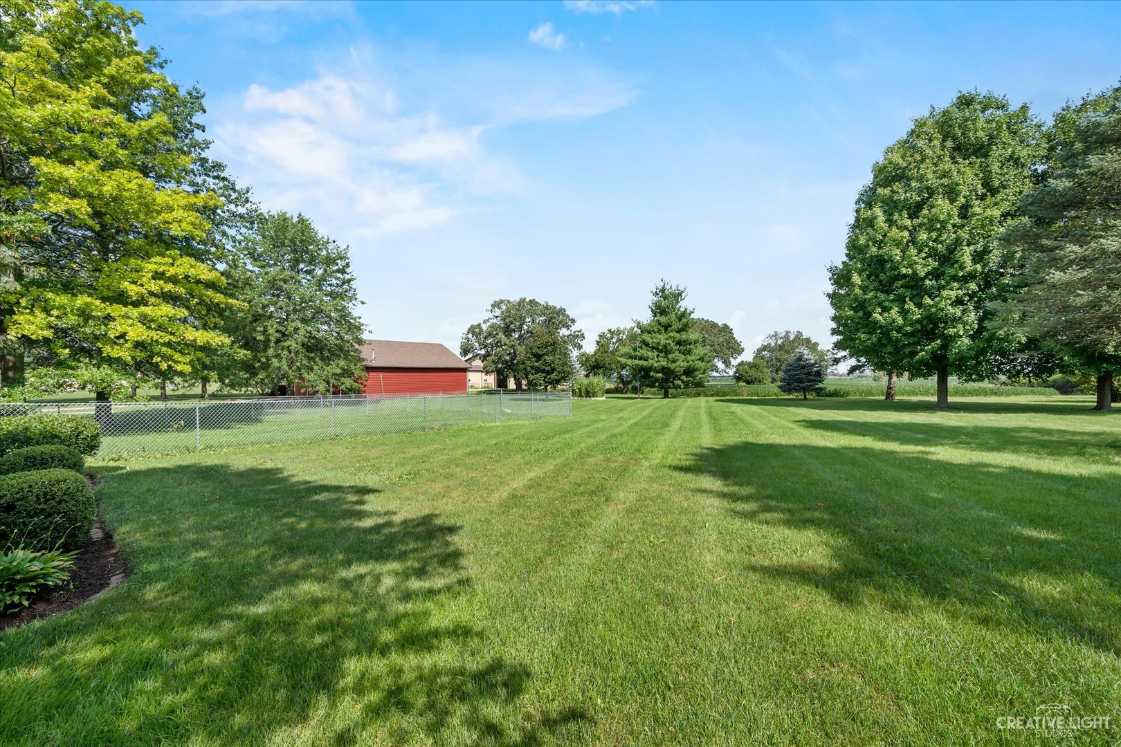 41-w492 Rohrsen Road Hampshire, IL 60140 - Photo 8 of 39 a view of building with garden