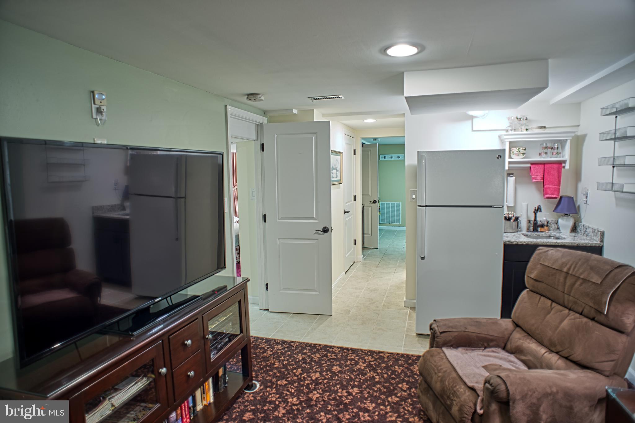 6709 Jerome Street Springfield, VA 22150 - Photo 50 of 101 Lower Level Media Room (Kitchenette)