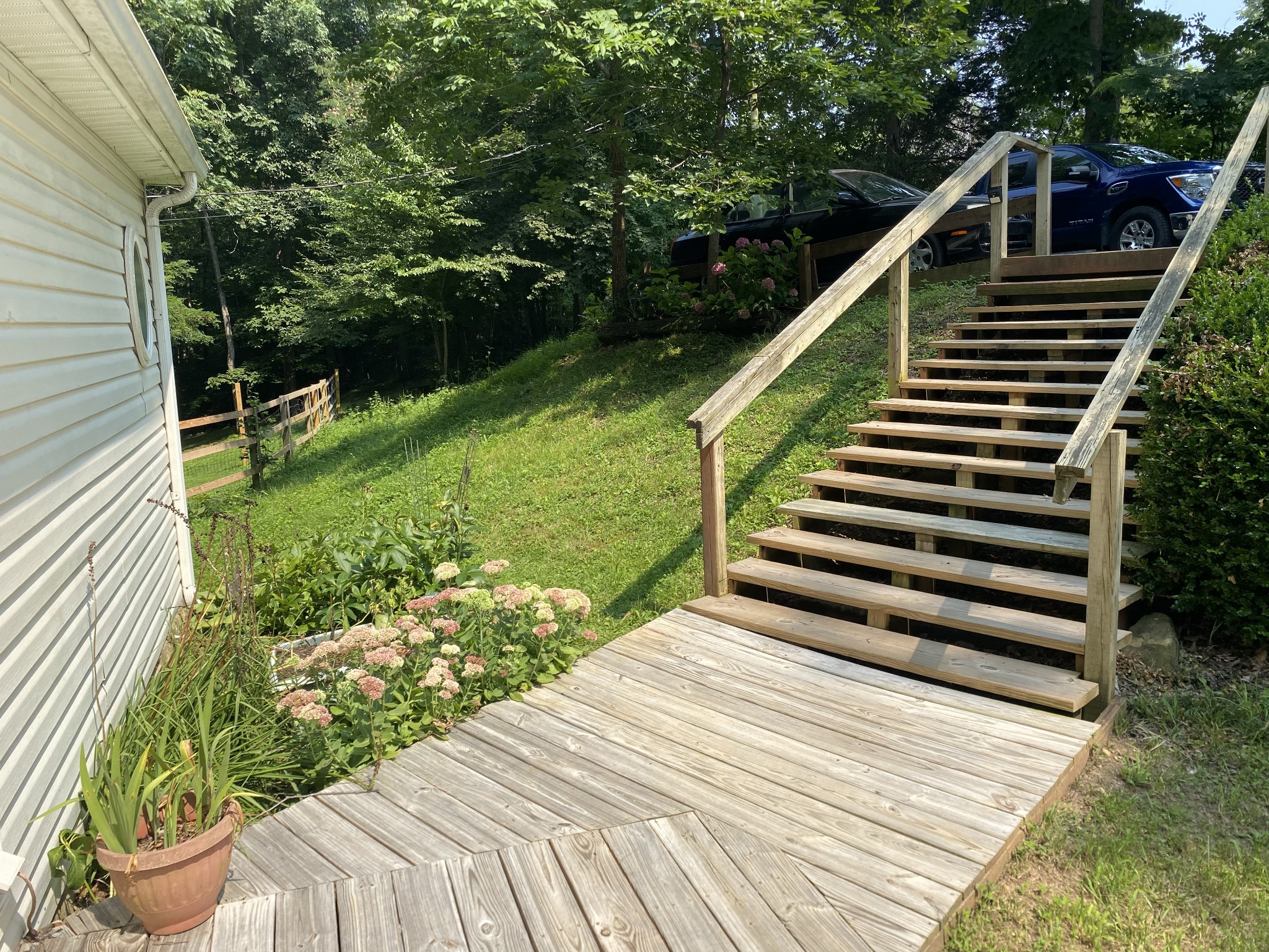 7549 King Road Fairview, TN 37062 - Photo 5 of 29 a view of a wooden deck with a yard