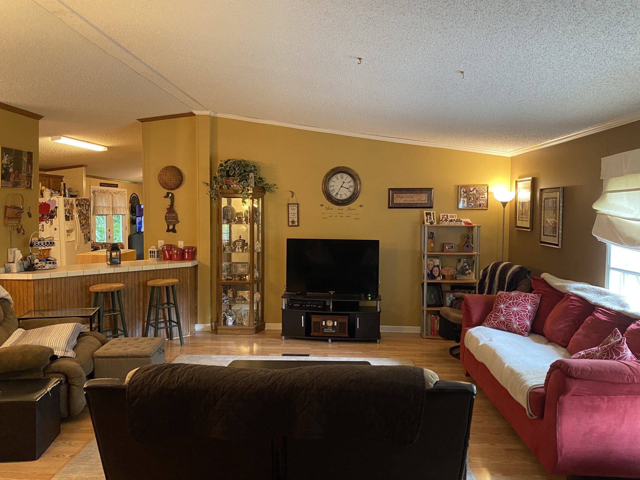 7549 King Road Fairview, TN 37062 - Photo 6 of 29 a living room with furniture a flat screen tv and a fireplace