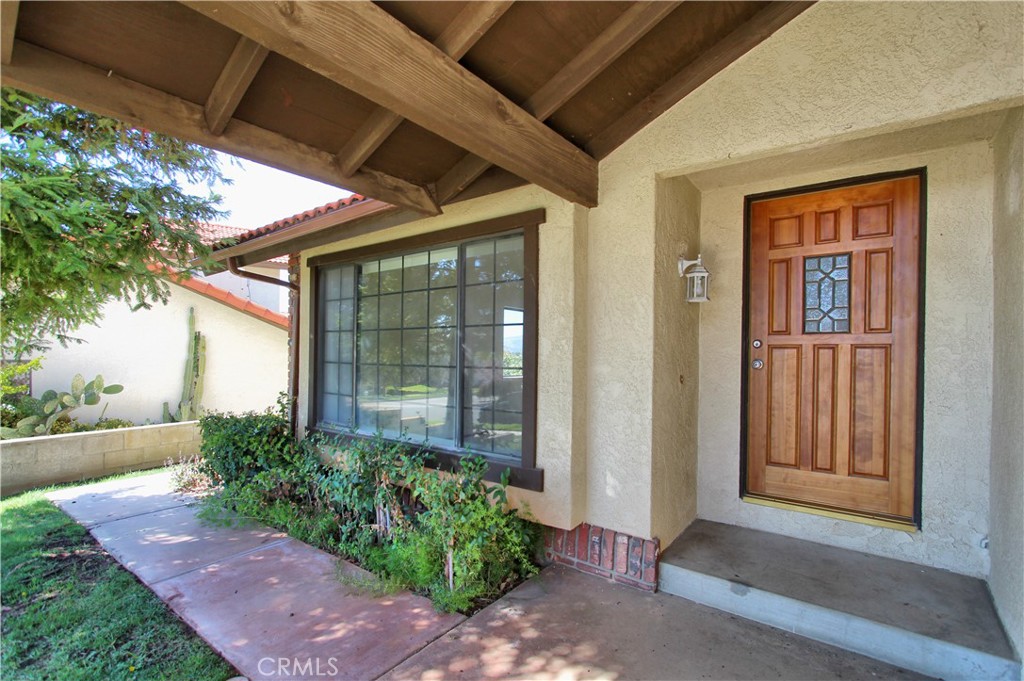 36116 Sharon Way Yucaipa, CA 92399 - Photo 4 of 34 a front view of a house with garden