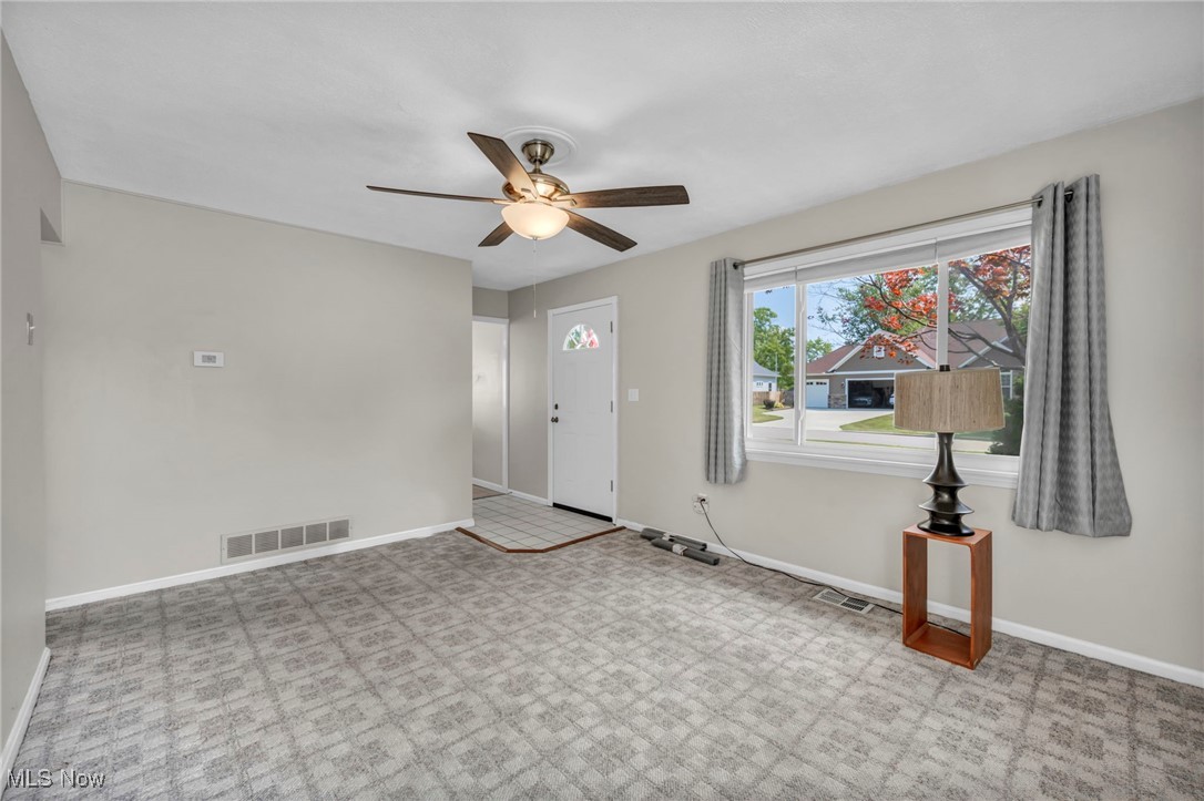 5038 Forest Road Mentor, OH 44060 - Photo 6 of 29 Foyer entrance featuring ceiling fan