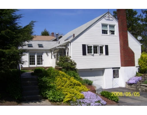 157 Beaconsfield Road Worcester, MA 01602 - Photo 3 of 19 a front view of a house with a garden