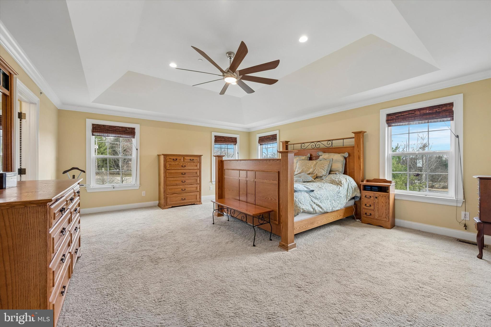 301 Jennifer Lane Exton, PA 19341 - Photo 21 of 41 a spacious bedroom with a bed and a large window