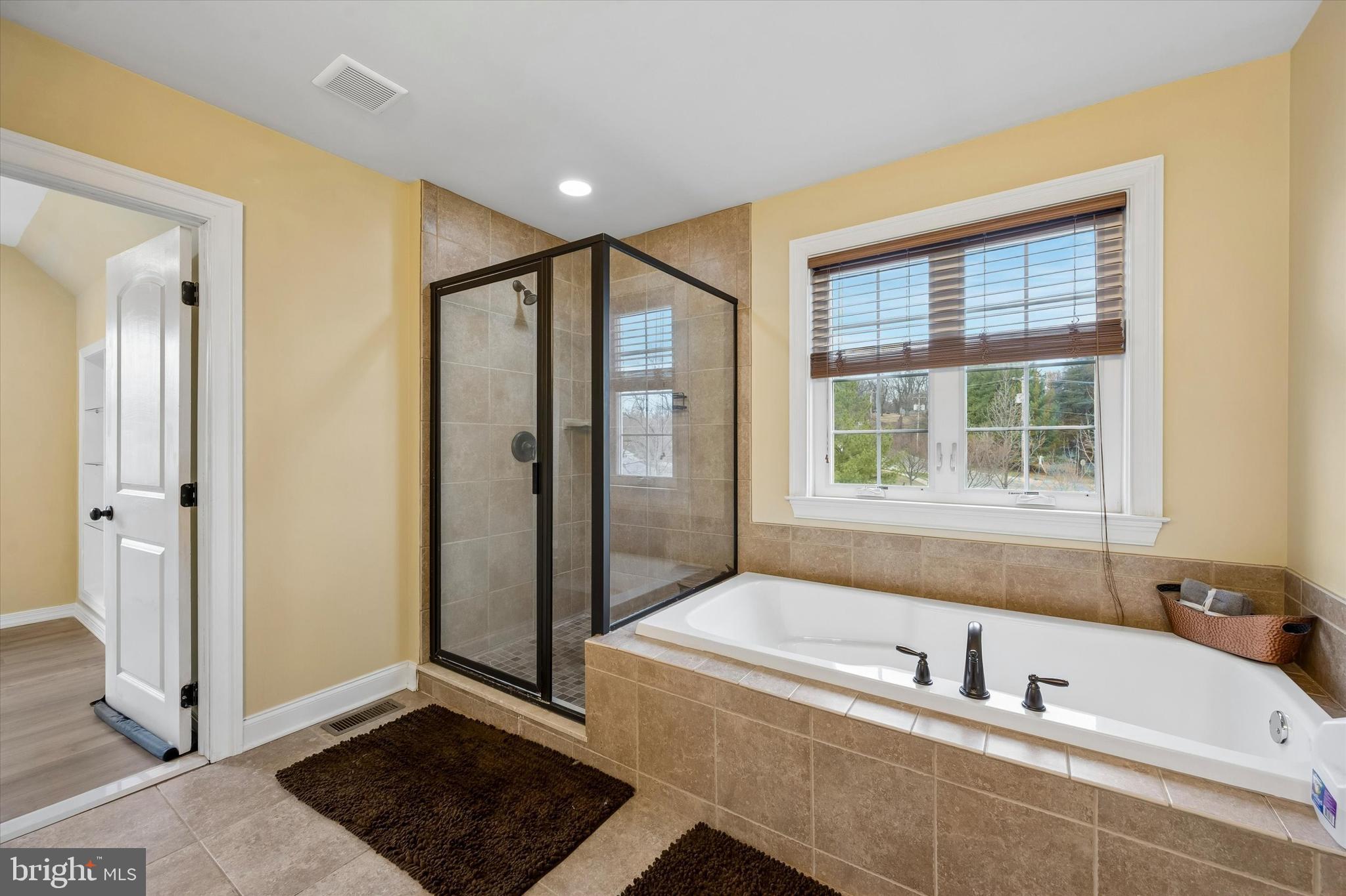 301 Jennifer Lane Exton, PA 19341 - Photo 24 of 41 a bathroom with a bathtub and a shower