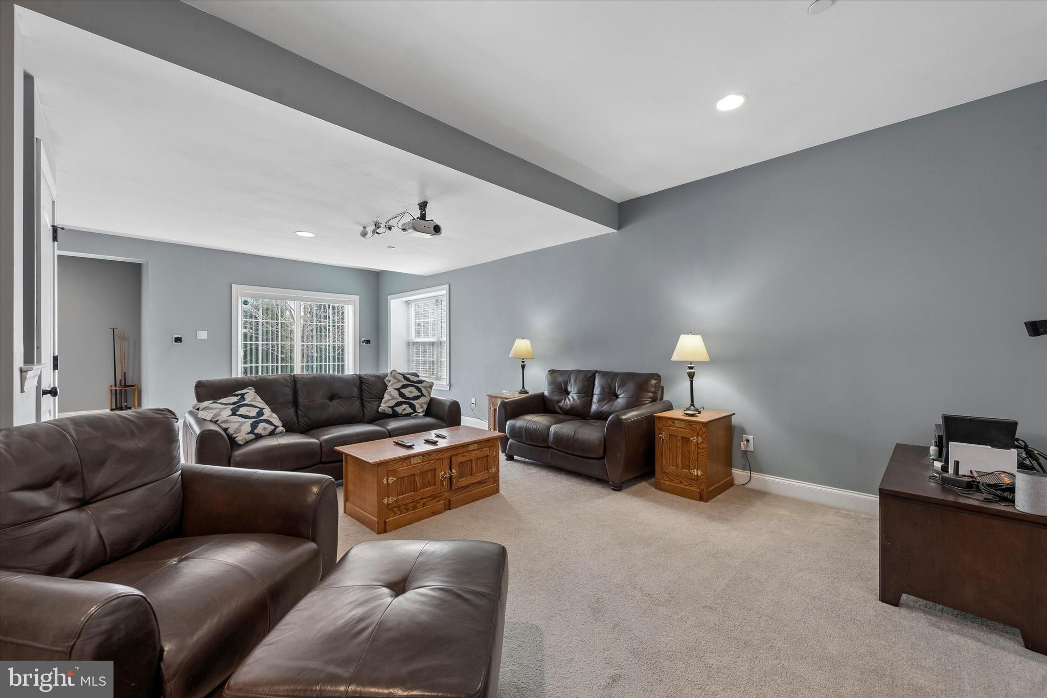 301 Jennifer Lane Exton, PA 19341 - Photo 32 of 41 a living room with furniture and a couch