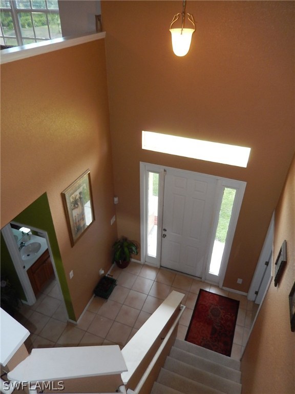 425 Jourferie Road Lehigh Acres, FL 33974 - Photo 13 of 25 a living room with furniture and a rug
