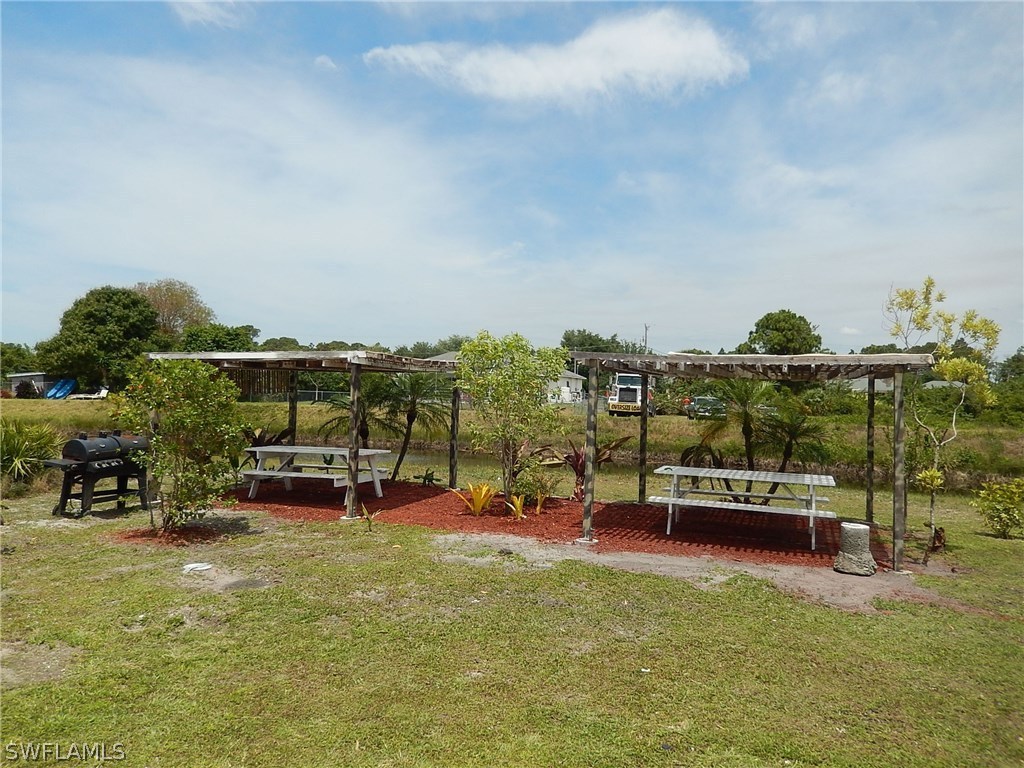 425 Jourferie Road Lehigh Acres, FL 33974 - Photo 24 of 25 a view of a outdoor space