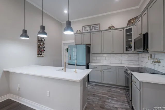 a bathroom with a sink double vanity granite and a mirror