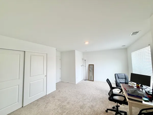a view of staircase with white walls and white walls