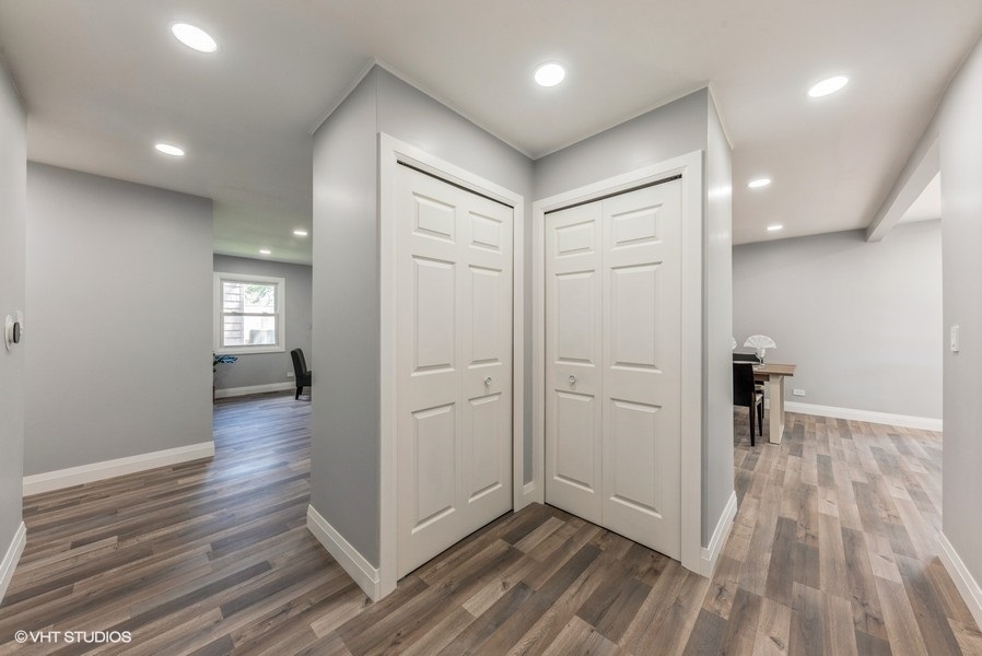 135 Timber Hill Road Buffalo Grove, IL 60089 - Photo 3 of 22 wooden floor in an empty room with wooden floor