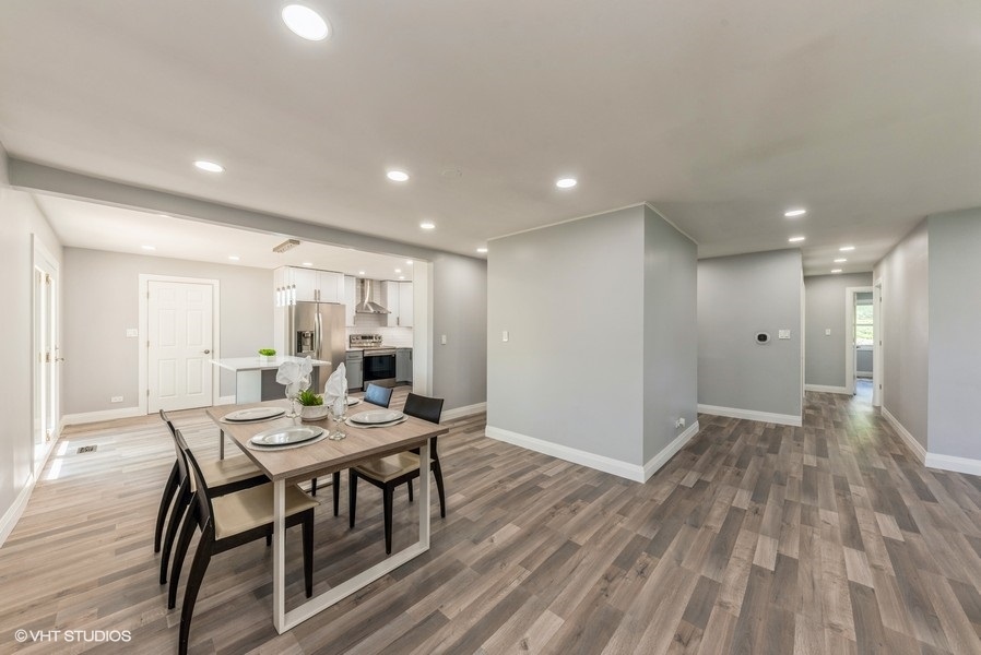 135 Timber Hill Road Buffalo Grove, IL 60089 - Photo 9 of 22 a view of a dining room with furniture