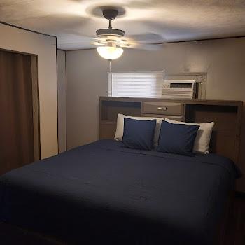 22235 North Foresthill Road, Unit 47 Foresthill, CA 95631 - Photo 6 of 8 a bed sitting in a room next to a window