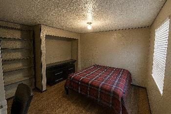 22235 North Foresthill Road, Unit 47 Foresthill, CA 95631 - Photo 7 of 8 a bedroom with a bed and a window