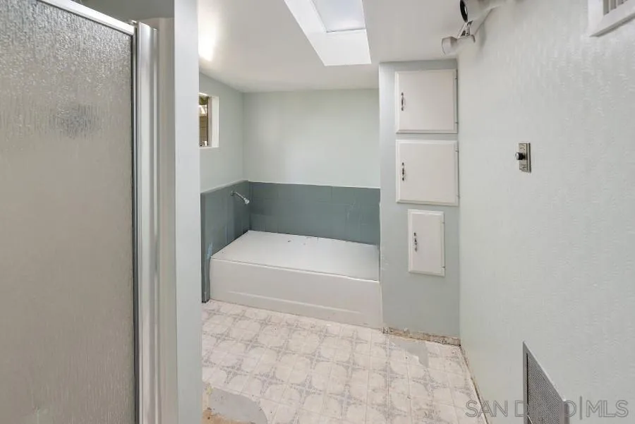 28949 Miller Road Valley Center, CA 92082 - Photo 54 of 55 a bathroom with a tub and shower
