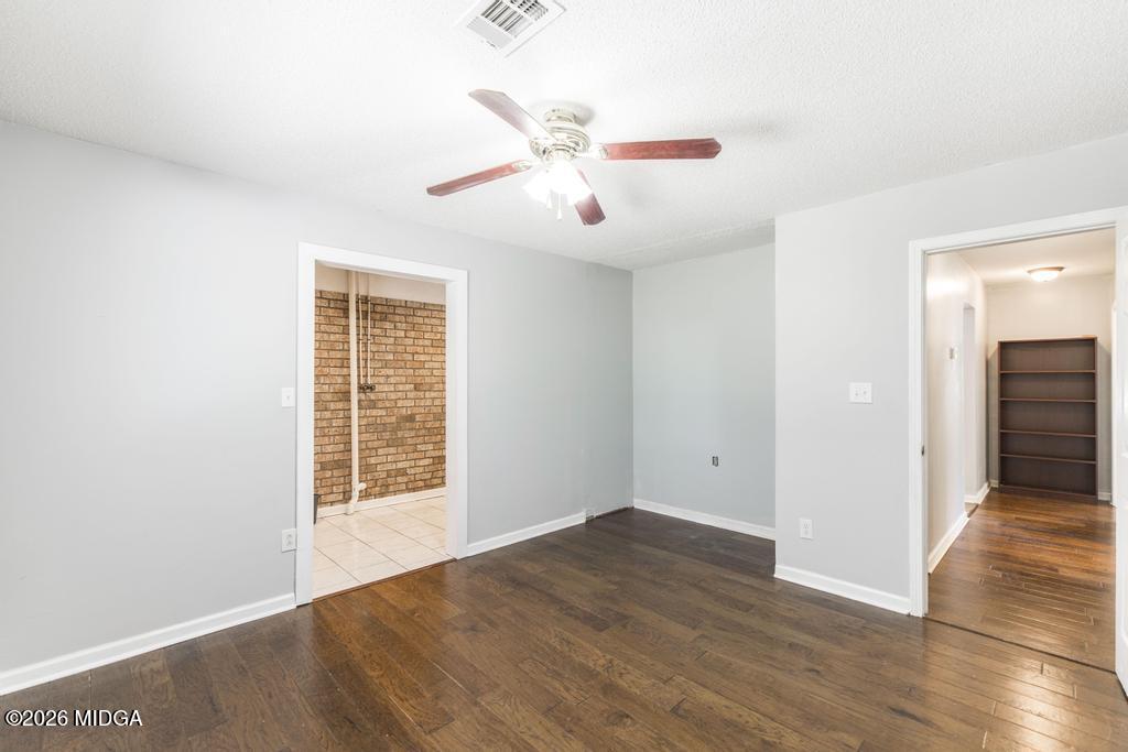 3710 Sandy Circle Macon, GA 31216 - Photo 30 of 44 wooden floor in an empty room with a window