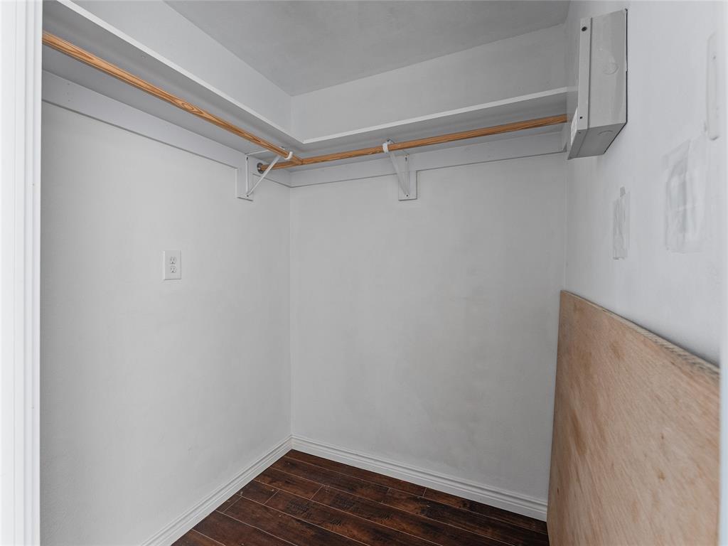 1100 West Trinity Mills Road, Unit 3032 Carrollton, TX 75006 - Photo 17 of 31 a view of an empty walk in closet