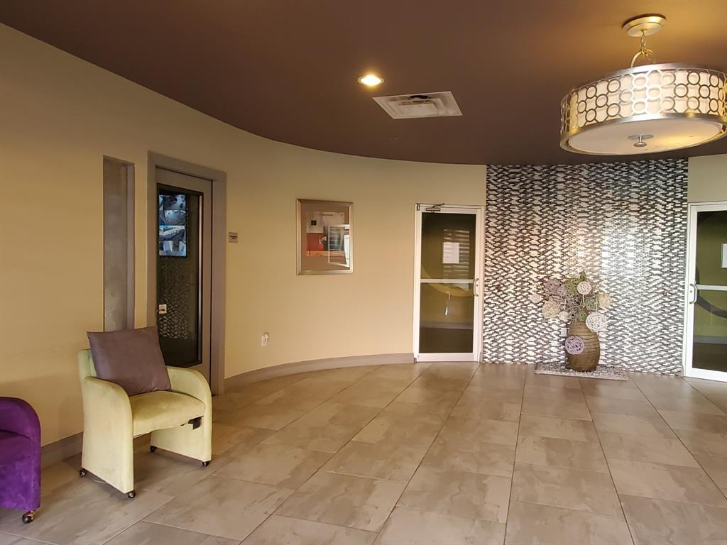1100 West Trinity Mills Road, Unit 3032 Carrollton, TX 75006 - Photo 19 of 31 a view of entryway with livingroom