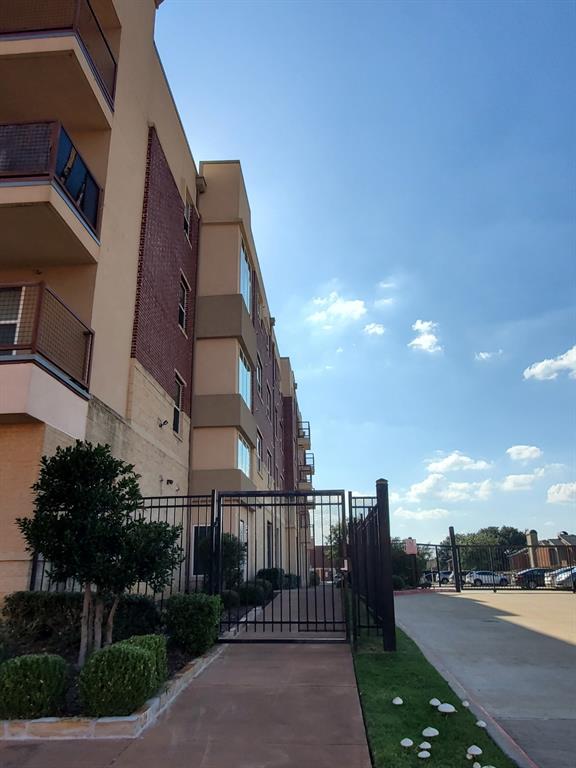 1100 West Trinity Mills Road, Unit 3032 Carrollton, TX 75006 - Photo 29 of 31 a view of a city with tall buildings