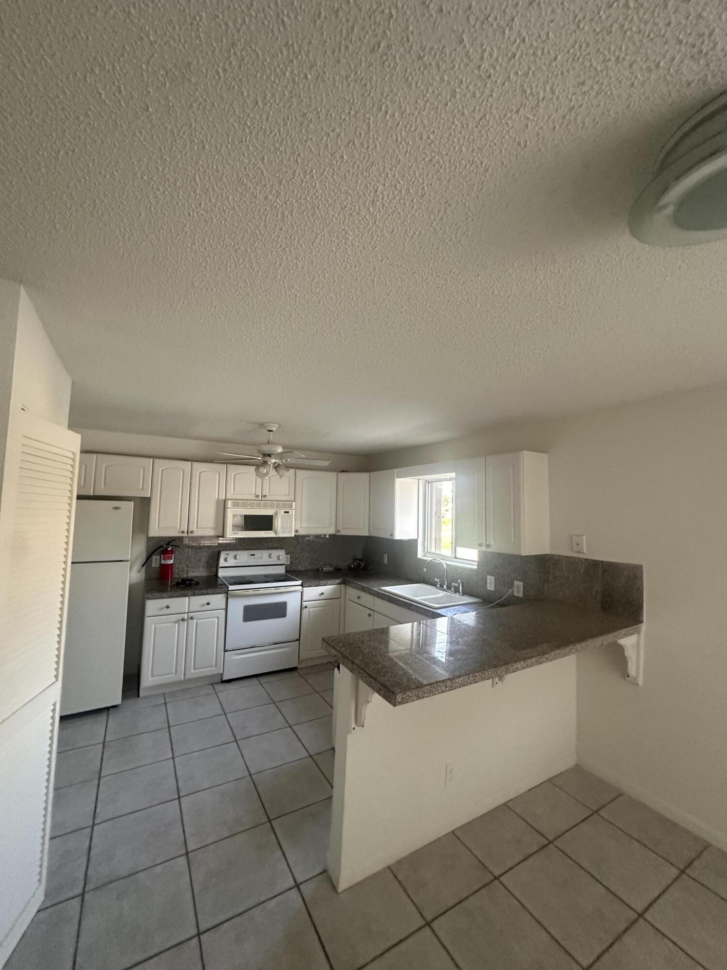 65 Maplecrest Circle Jupiter, FL 33458 - Photo 26 of 31 IMG_4295