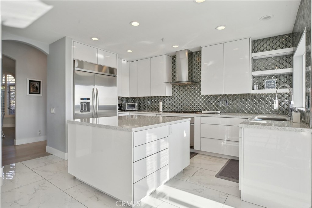 3 Via Pasa San Clemente, CA 92673 - Photo 14 of 55 a kitchen with stainless steel appliances granite countertop a sink and cabinets
