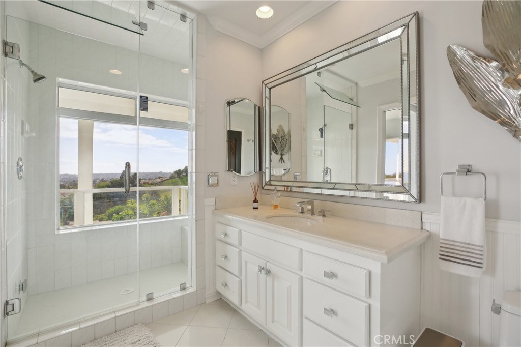 3 Via Pasa San Clemente, CA 92673 - Photo 40 of 55 a bathroom with a shower sink and mirror