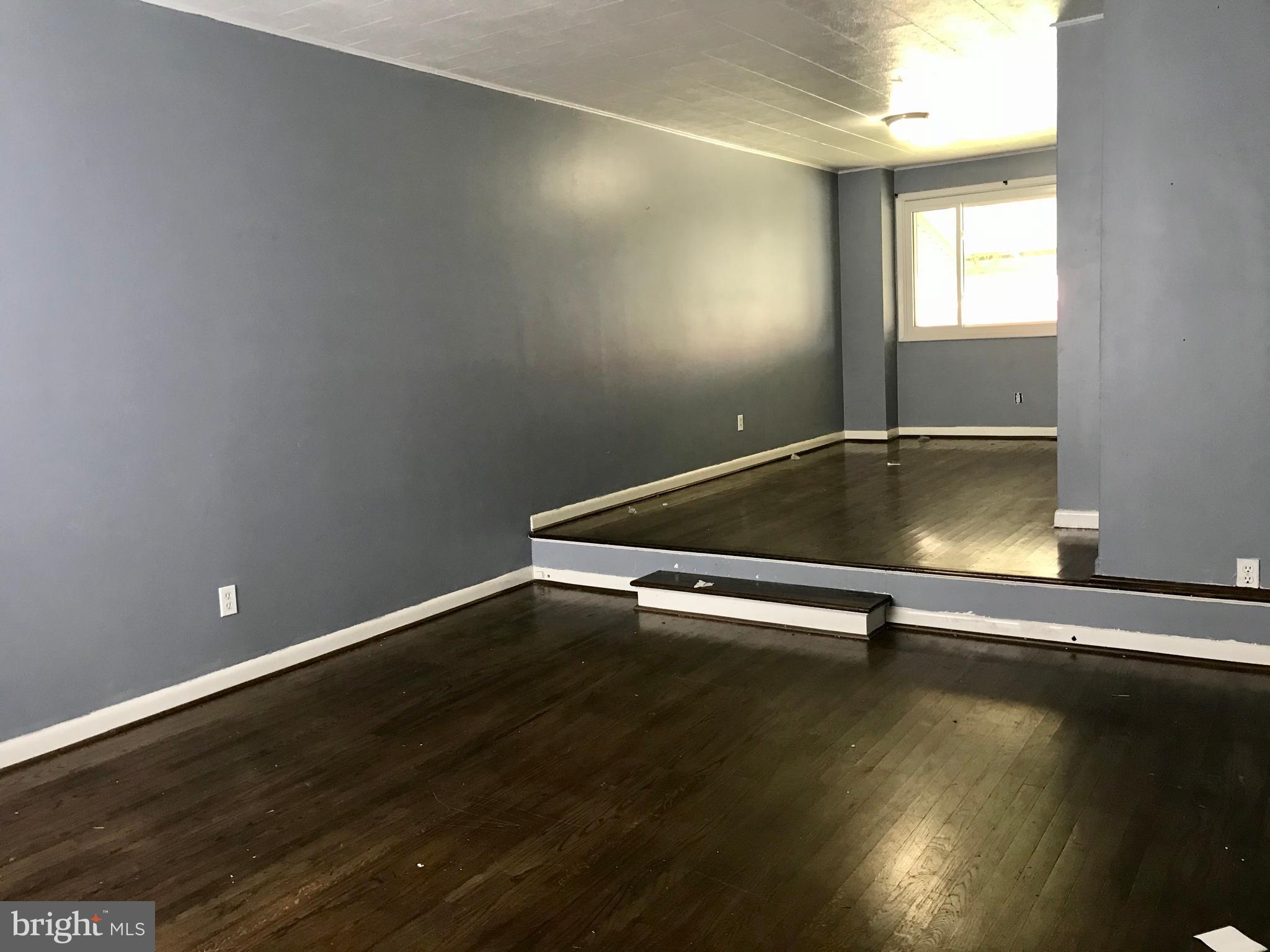 8167 Gray Haven Road Baltimore, MD 21222 - Photo 3 of 16 ROOMY LIV & DIN RM w/HARDWOOD FLOORING