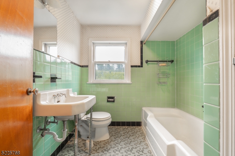 131 Karrville Road Port Murray, NJ 07865 - Photo 11 of 23 a bathroom with a sink toilet and shower