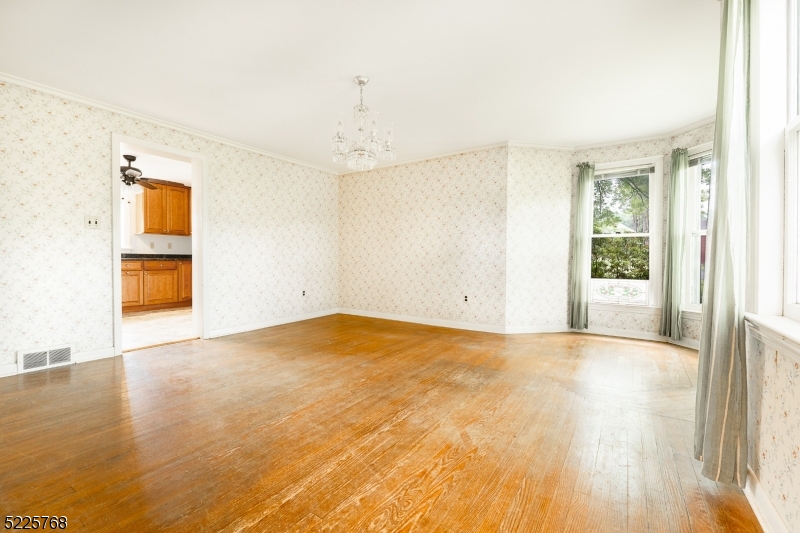 131 Karrville Road Port Murray, NJ 07865 - Photo 19 of 23 a view of an empty room with wooden floor and a window